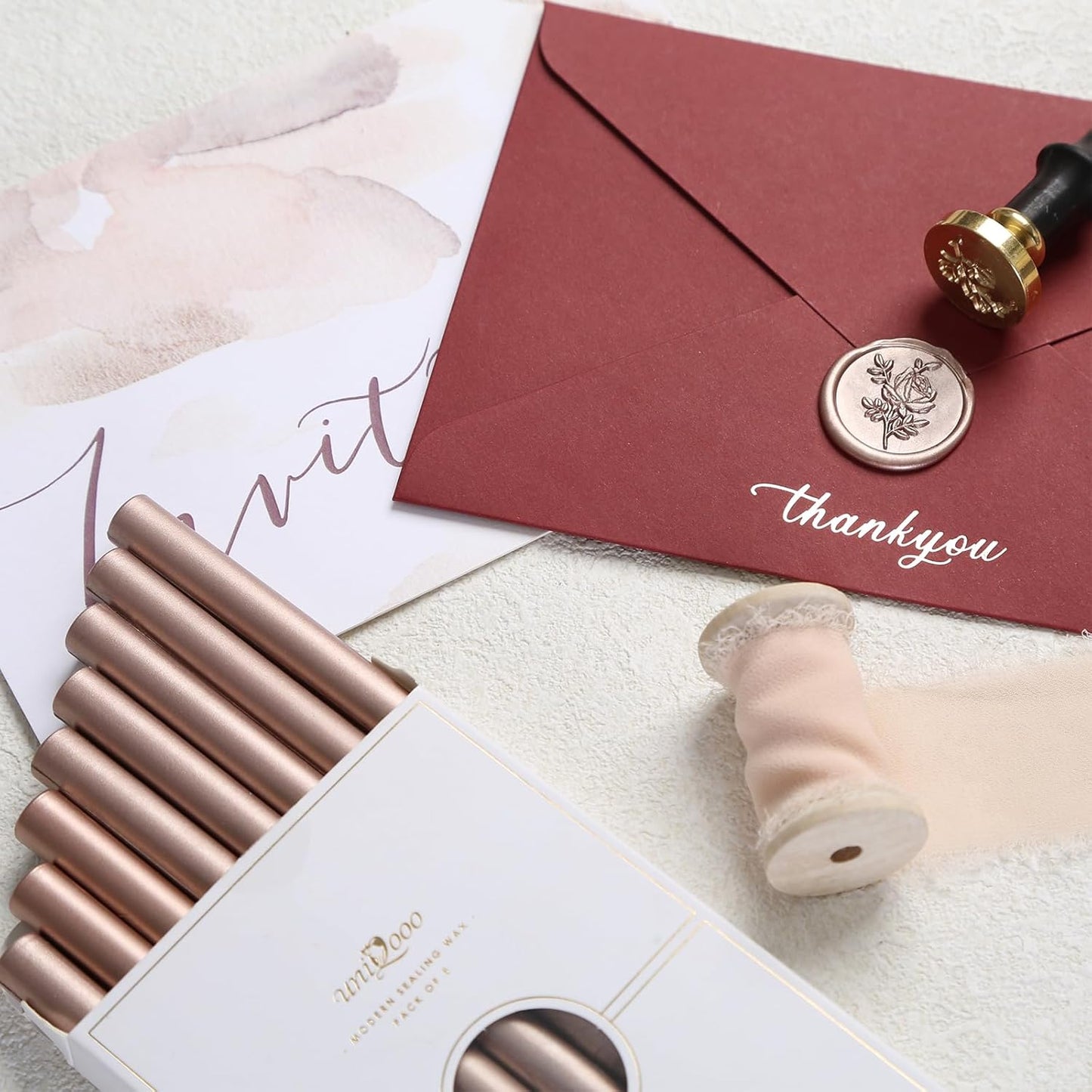 UNIQOOO Mailable Glue Gun Sealing Wax Sticks for Wax Seal Stamp - Metallic Champagne Gold, Great for Xmas Cards, Wedding Invitations, Cards Envelopes, Snail Mails, Wine Packages, Gift Ideas, Pack of 8