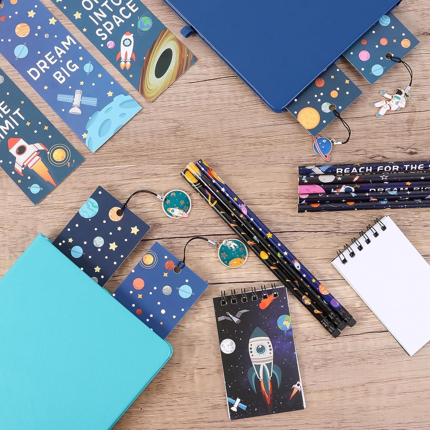 Kolewo4ever 148 Pieces Outer Space Theme Stationery Set:100 Space Pencils Astronaut Pencils 24 Planet Rocket Mini Spiral Notepad Memo Pad 24 Space Ship Metal Charms Bookmarks